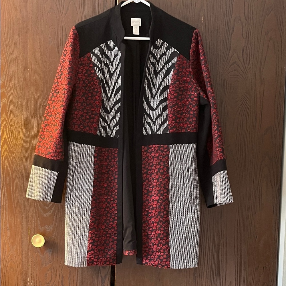Chico’s streamlined, modernist animal print long jacket. Size Chico 2.